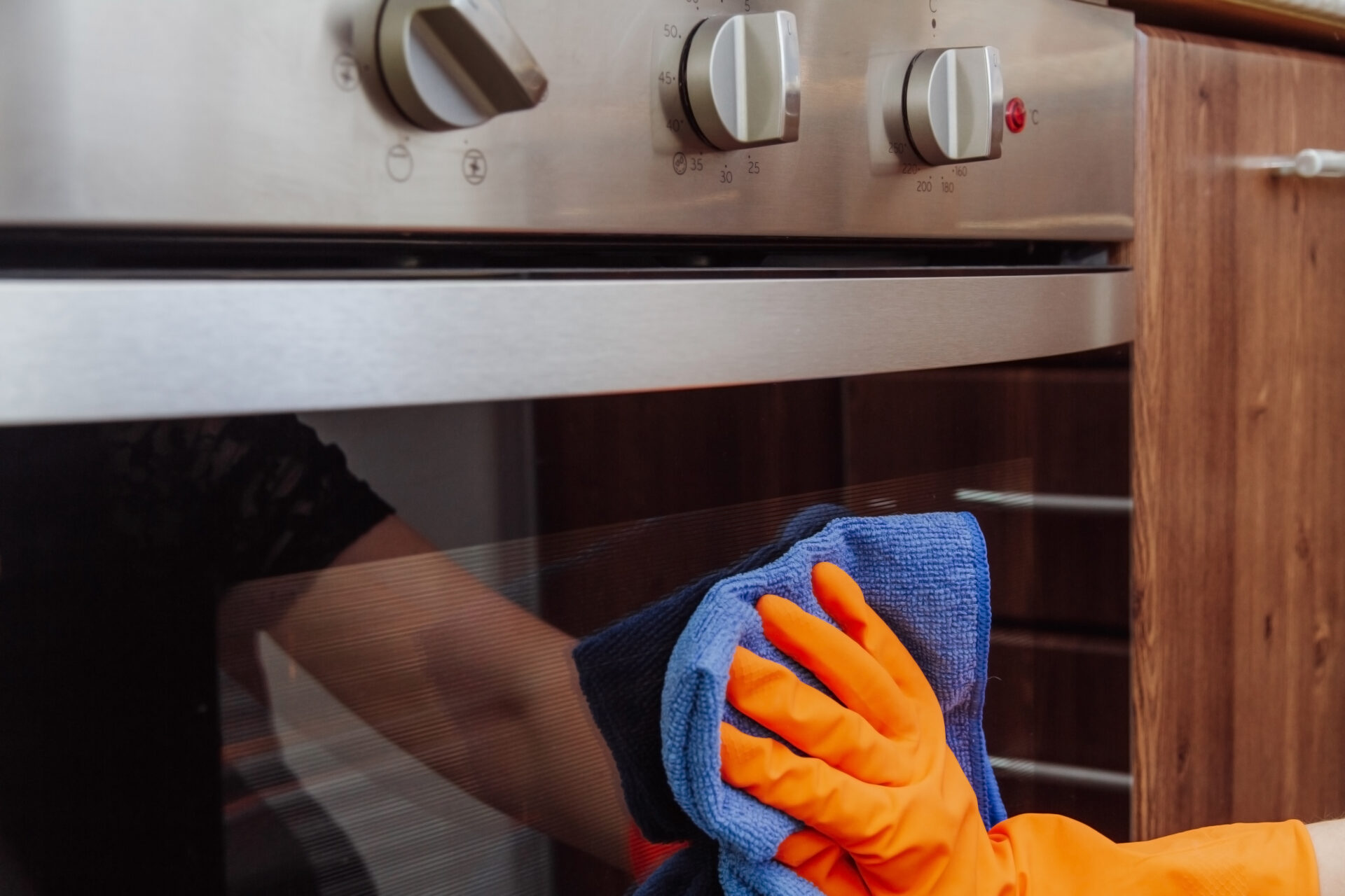 Hand with a microfiber cloth