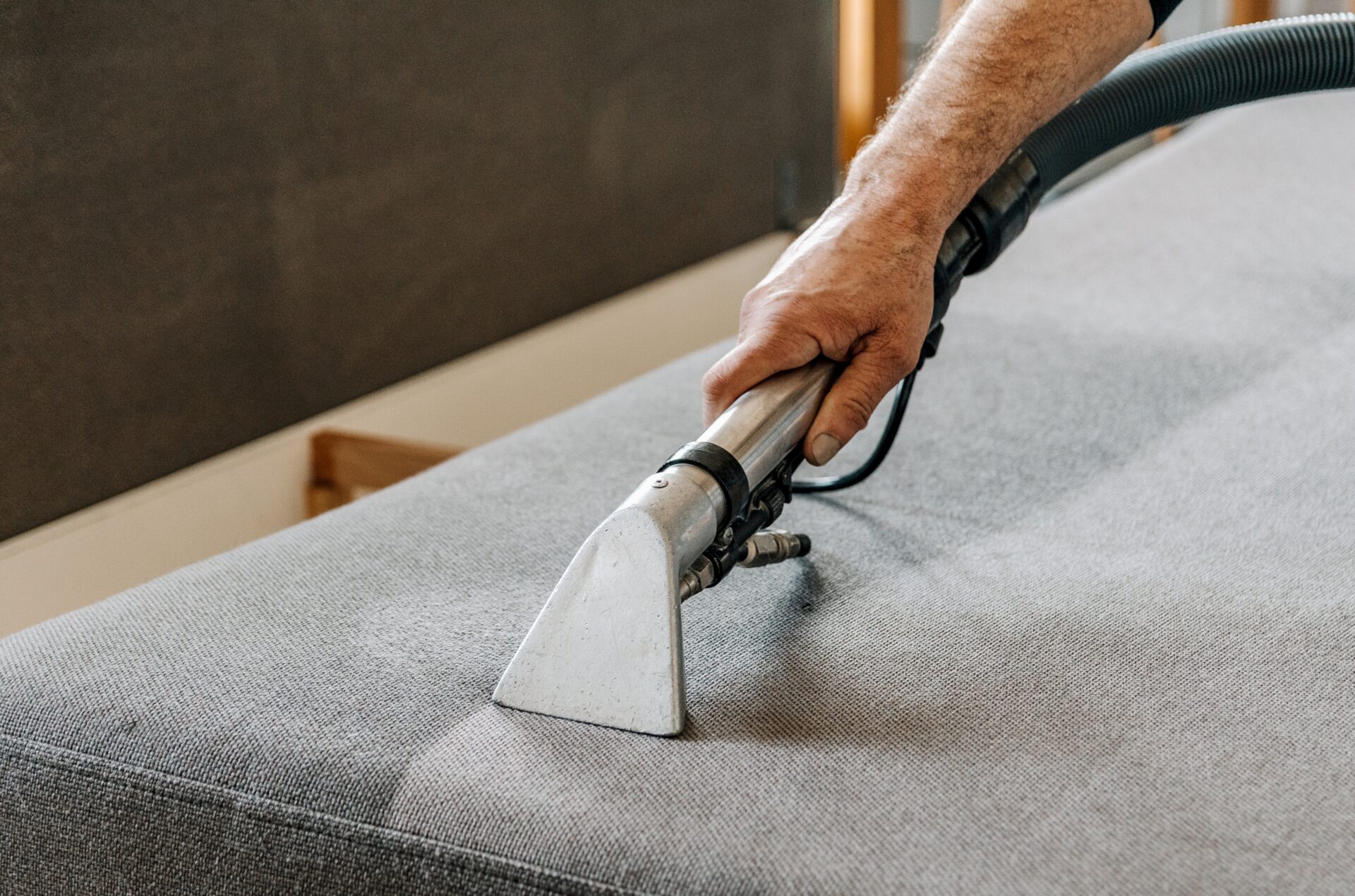 close-up-of-couch-cleaning-with-vacuum
