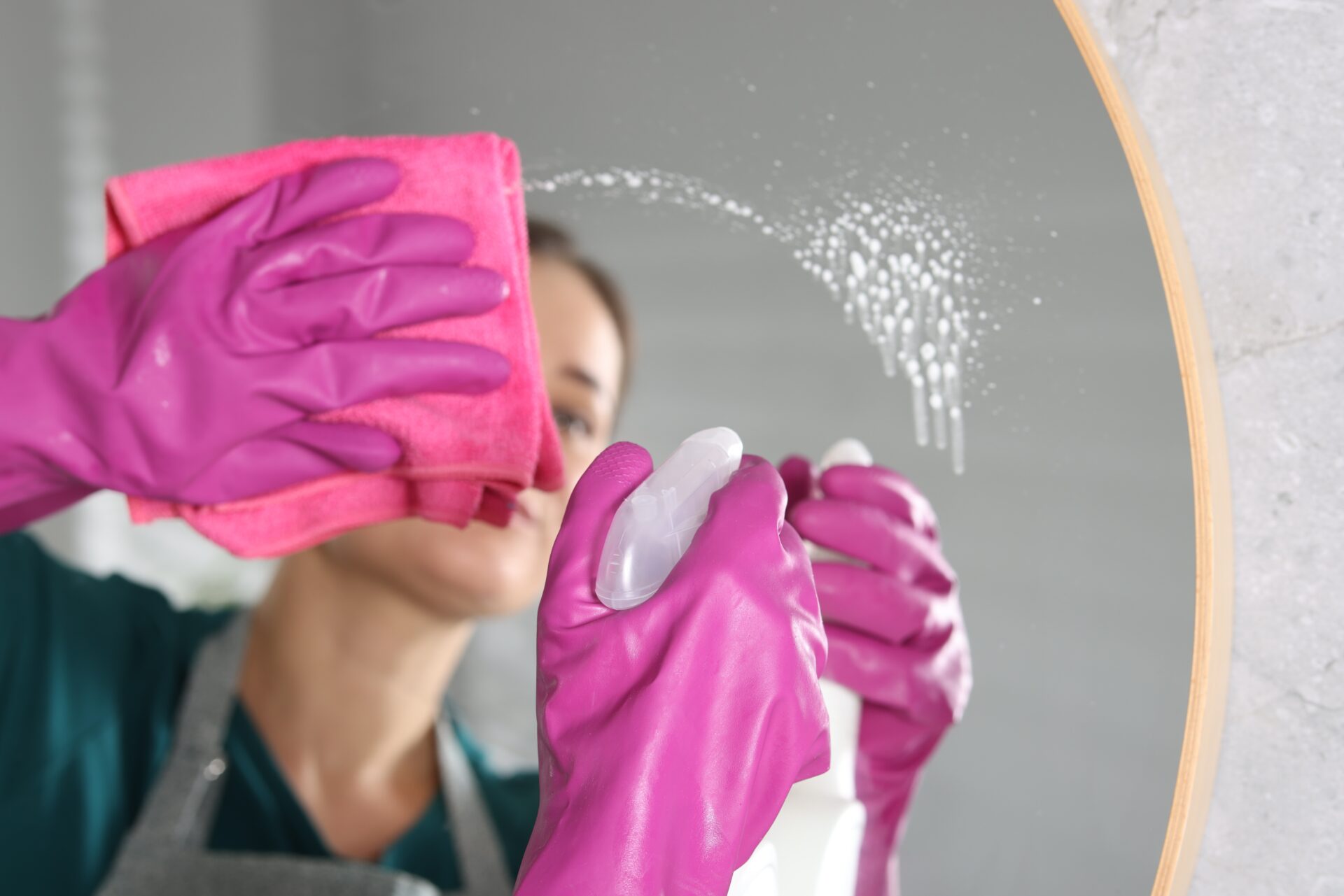 Woman using cleaning product